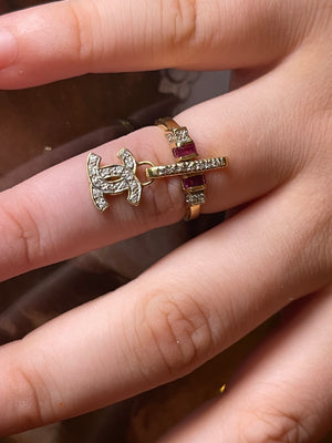CHANEL dangle ring with diamonds and rubies set an 18 karat gold.