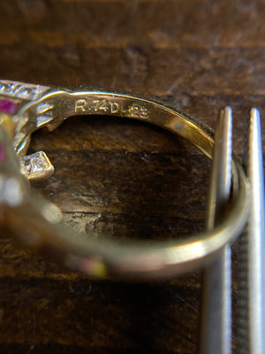 CHANEL dangle ring with diamonds and rubies set an 18 karat gold.