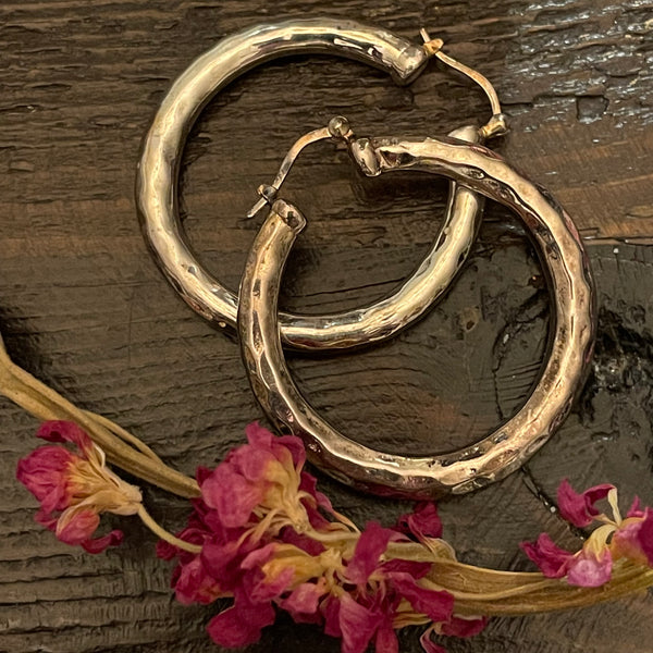 Hollow sterling silver hoop earrings With hammered finish