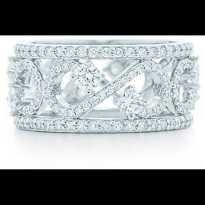 Tiffany & Co enchant scroll diamond platinum band ring