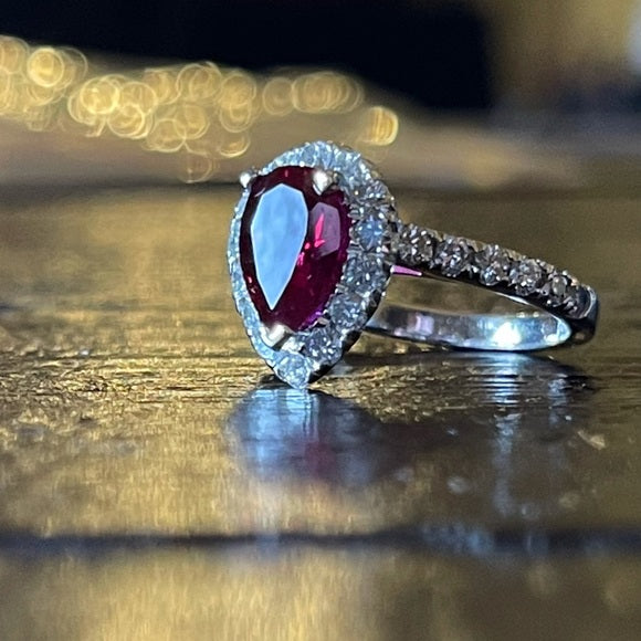 Pear Ruby & Diamond Halo Engagement ring set in 14k white gold