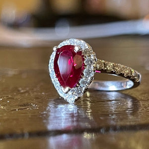 Pear Ruby & Diamond Halo Engagement ring set in 14k white gold