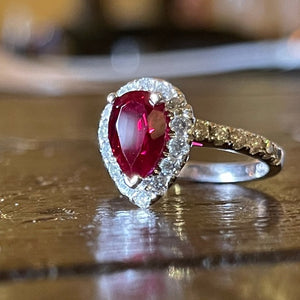 Pear Ruby & Diamond Halo Engagement ring set in 14k white gold