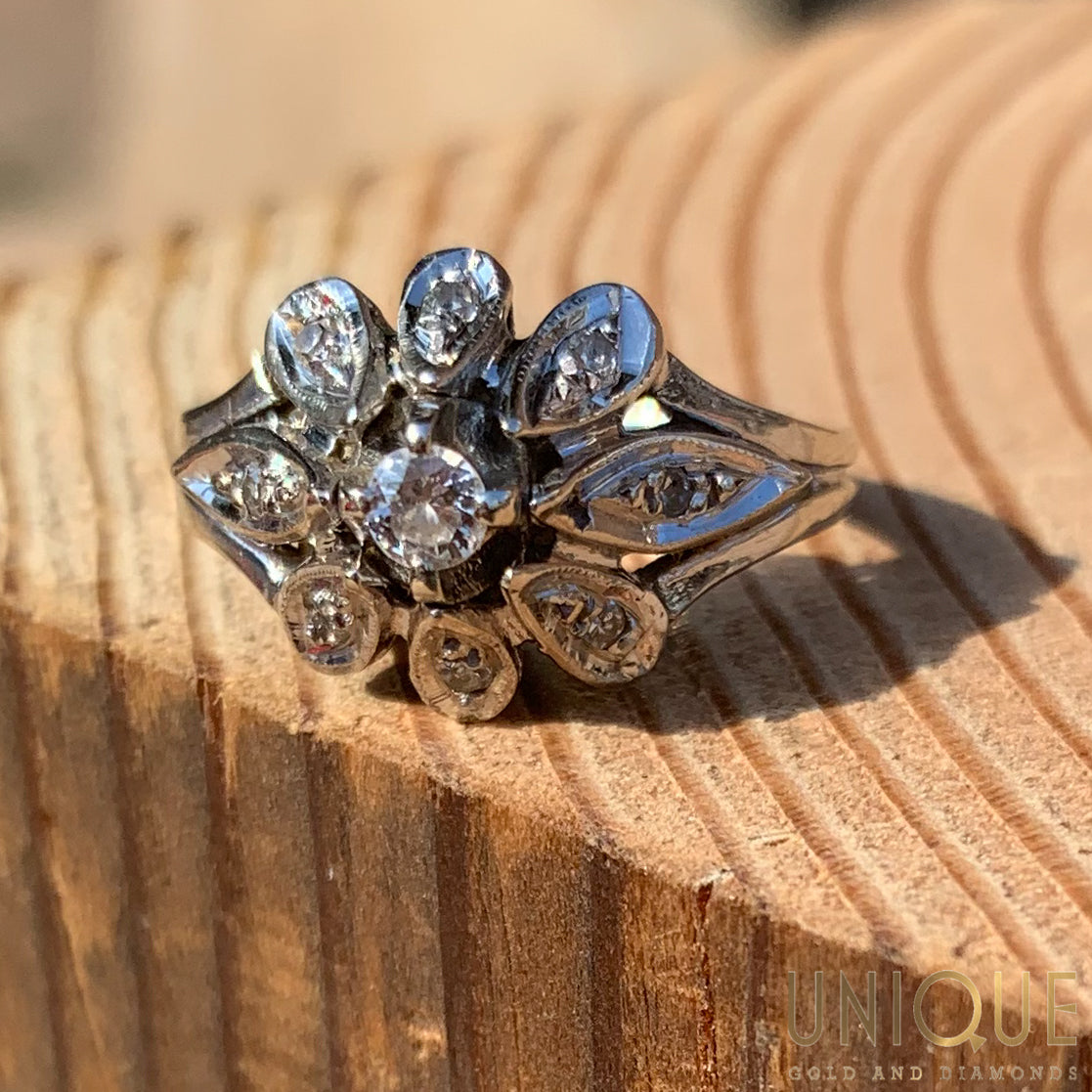 Antique flower engagement ring top