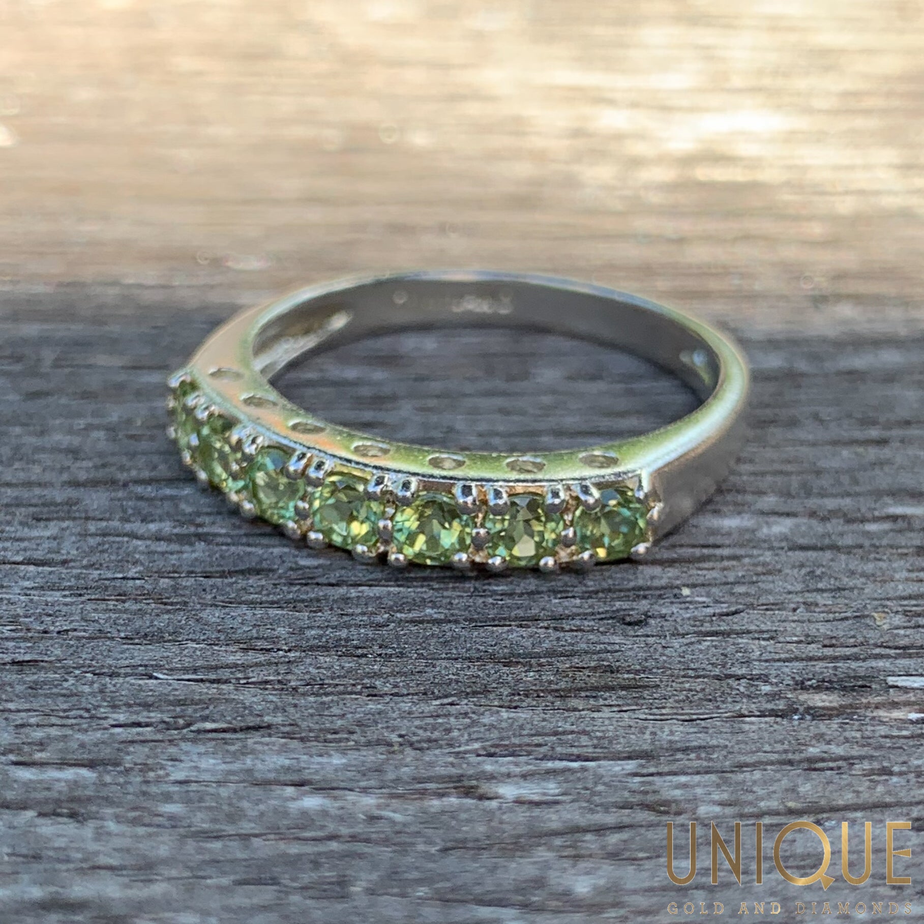 Pale green cheap peridot ring